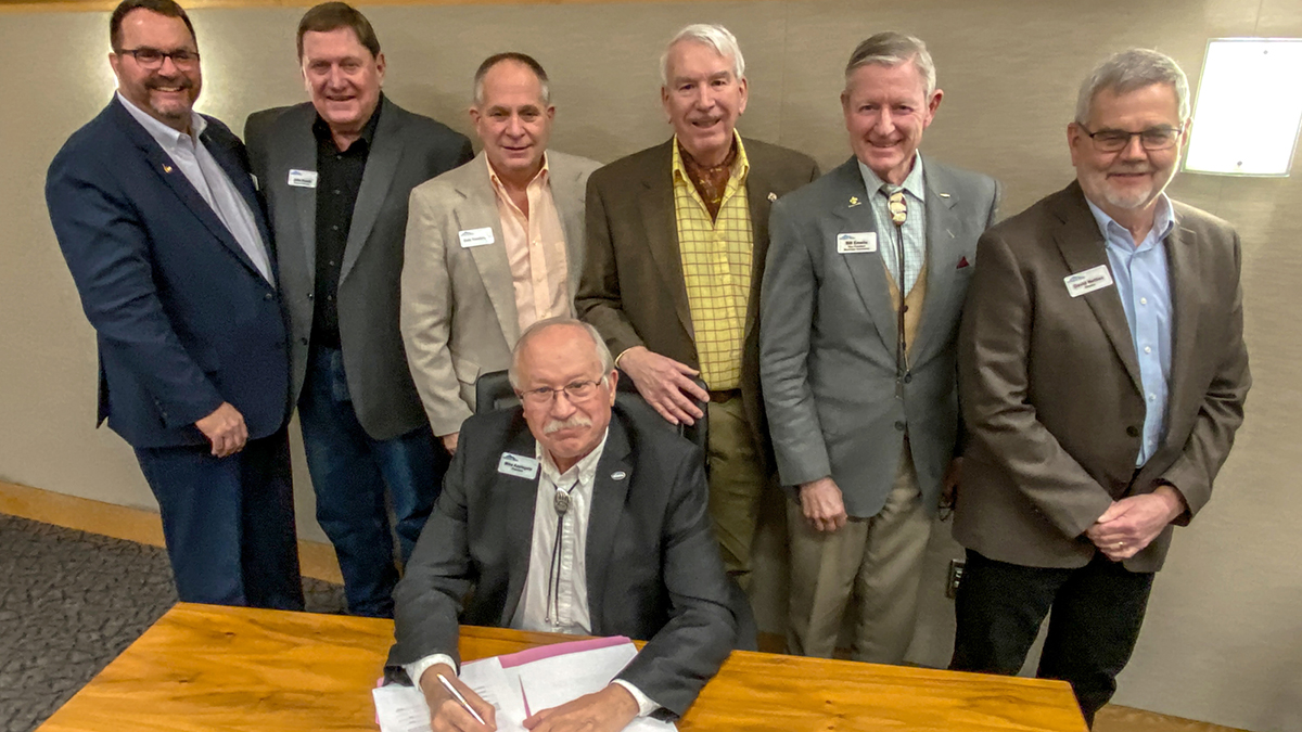 Board of Directors signing the NISP 404 permit in Jan 2023