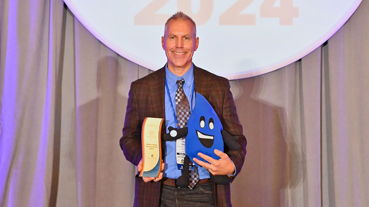 Frank Kinder on stage accepting WaterSense award 