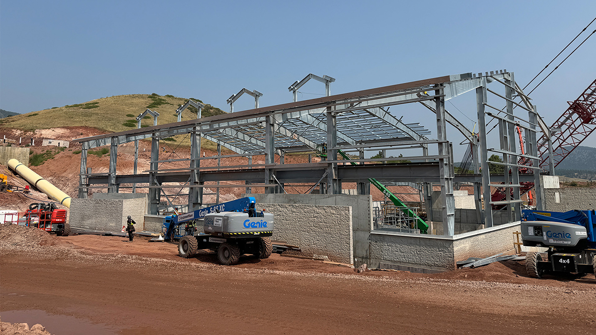 Construction of the valve house at Chimney Hollow Reservoir shows the structure going vertical