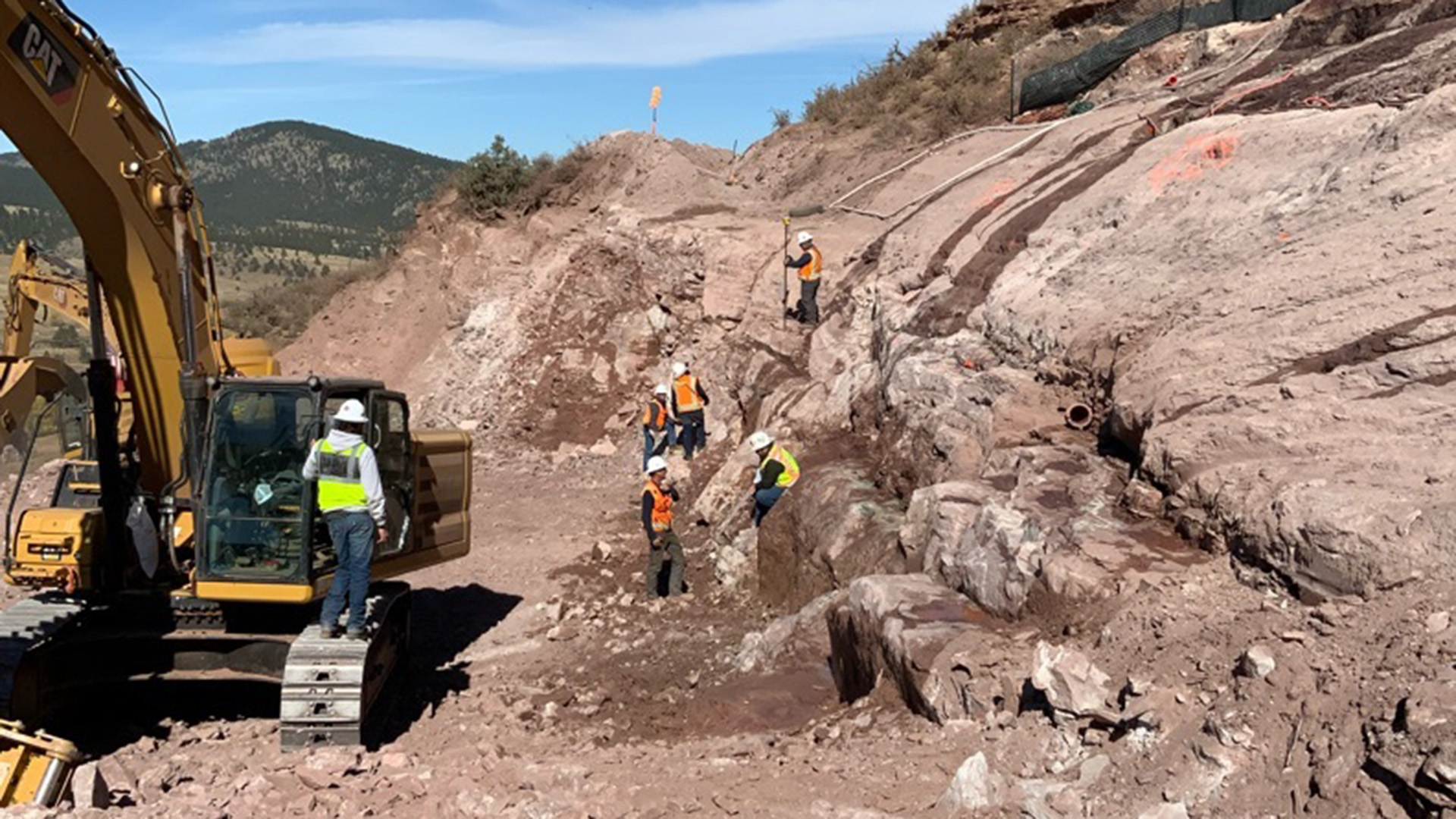 Foundation cleaning and geologic mapping at the right abutment of the main dam.