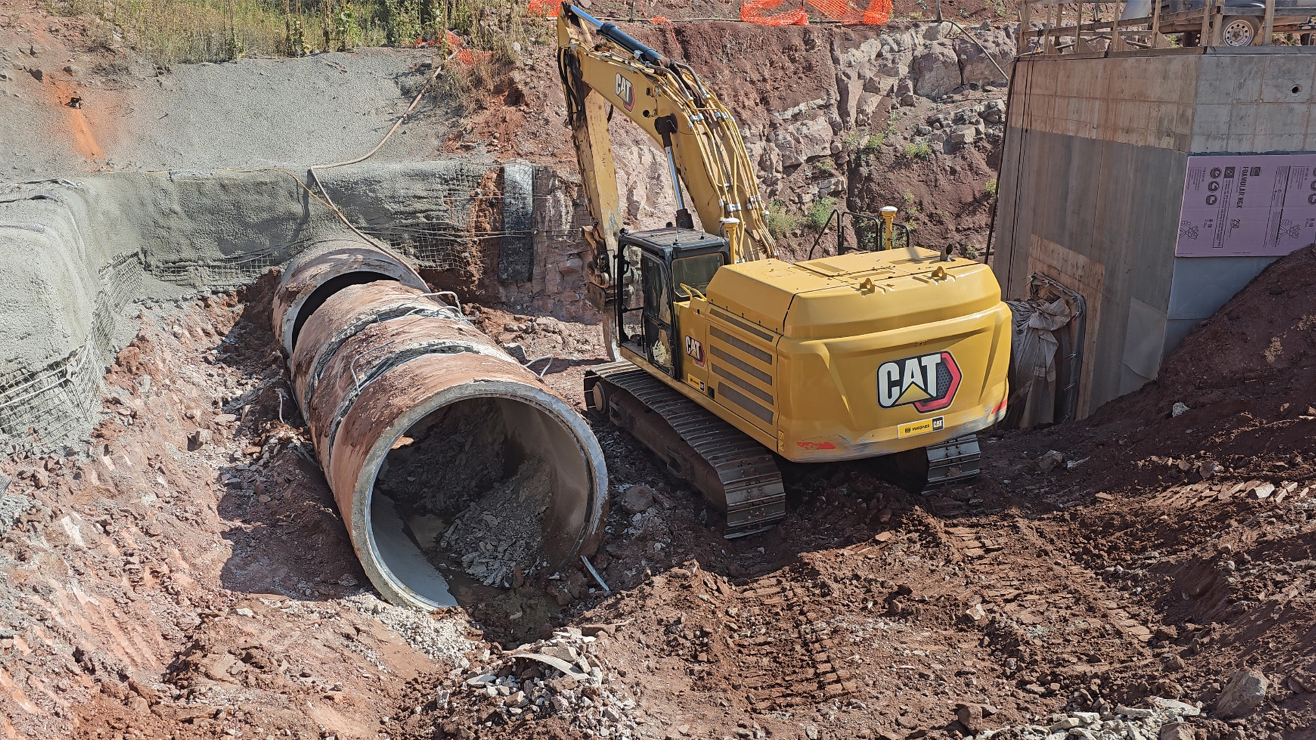 Excavator and pipe at the Carter Lake Secondary Isolation Vault