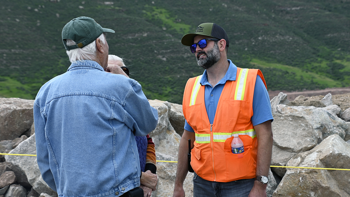 Principal Project Manager Joe Donnelly talking with neighbors