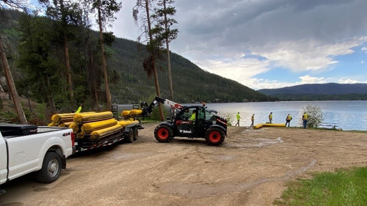 Debris booms removed from Grand Lake
