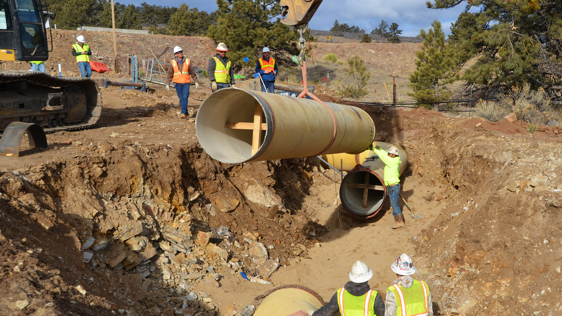 Last underground pipe being placed on SWSP
